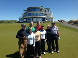 PerryGolf clients in front of Castle Stuart Clubhouse