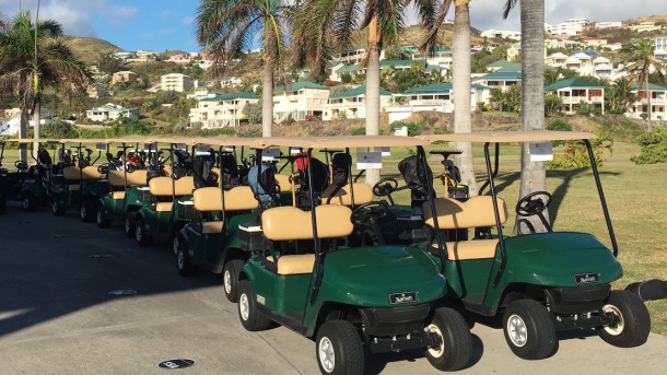 Royal St. Kitts Golf Club - Golf carts lined up and ready to roll - PerryGolf.com