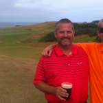 Father & son pairing of B. & C. Ackerman of Kalamazoo, Michigan toast their round at Kingsbarns Scotland