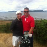 M. Koss of Richmond Canada celebrates a hole in one on Castle Stuart's par three #8. The first hole in one on the course since The Scottish Open won by Phil Mickelson. Pictured here with her caddie. Good club selection!