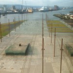 A great view, from the Titanic Belfast Center, of the build and launch site of the Titanic, the poles marking th exact area where Titanic sat during construction. PerryGolf's Azamara Quest lines up in the background (-: