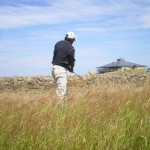 Mr. Venkatesh struggling to get to grips with the heavy rough at 18th on the Torrance Course. — in St Andrews, Scotland.