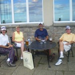 Mr. and Mrs. Sawyer and Mr. and Mrs. Todd enjoying a well earned refreshment after their round at Kingsbarns Golf Links. — in St Andrews, Scotland.