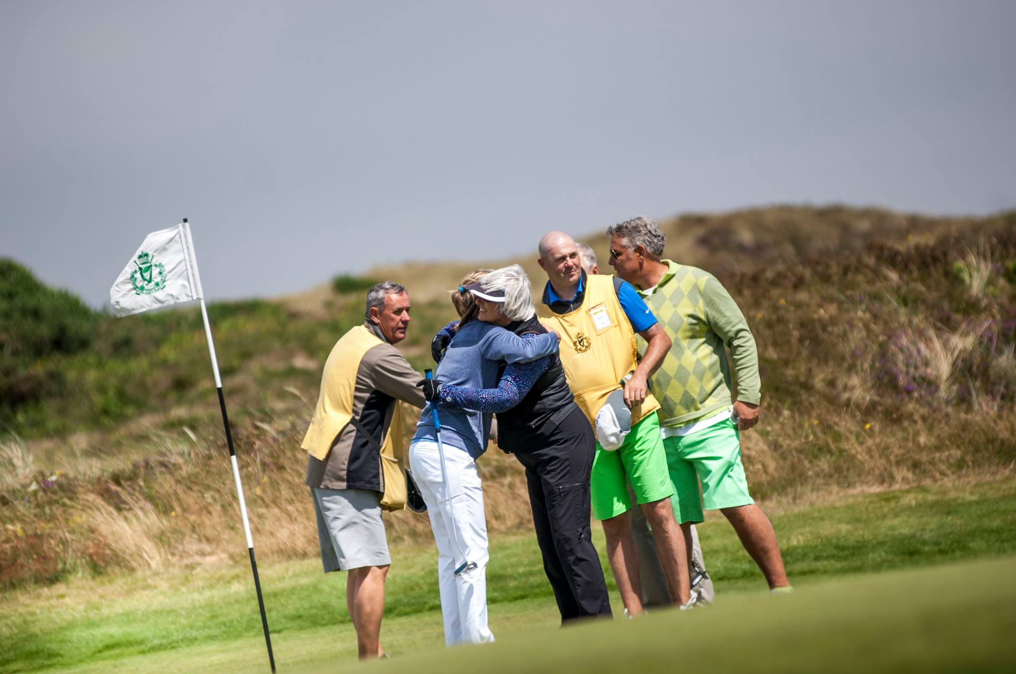 PerryGolf clients show sportsmanship at the conclusion of their round at at Royal County Down Golf Club.